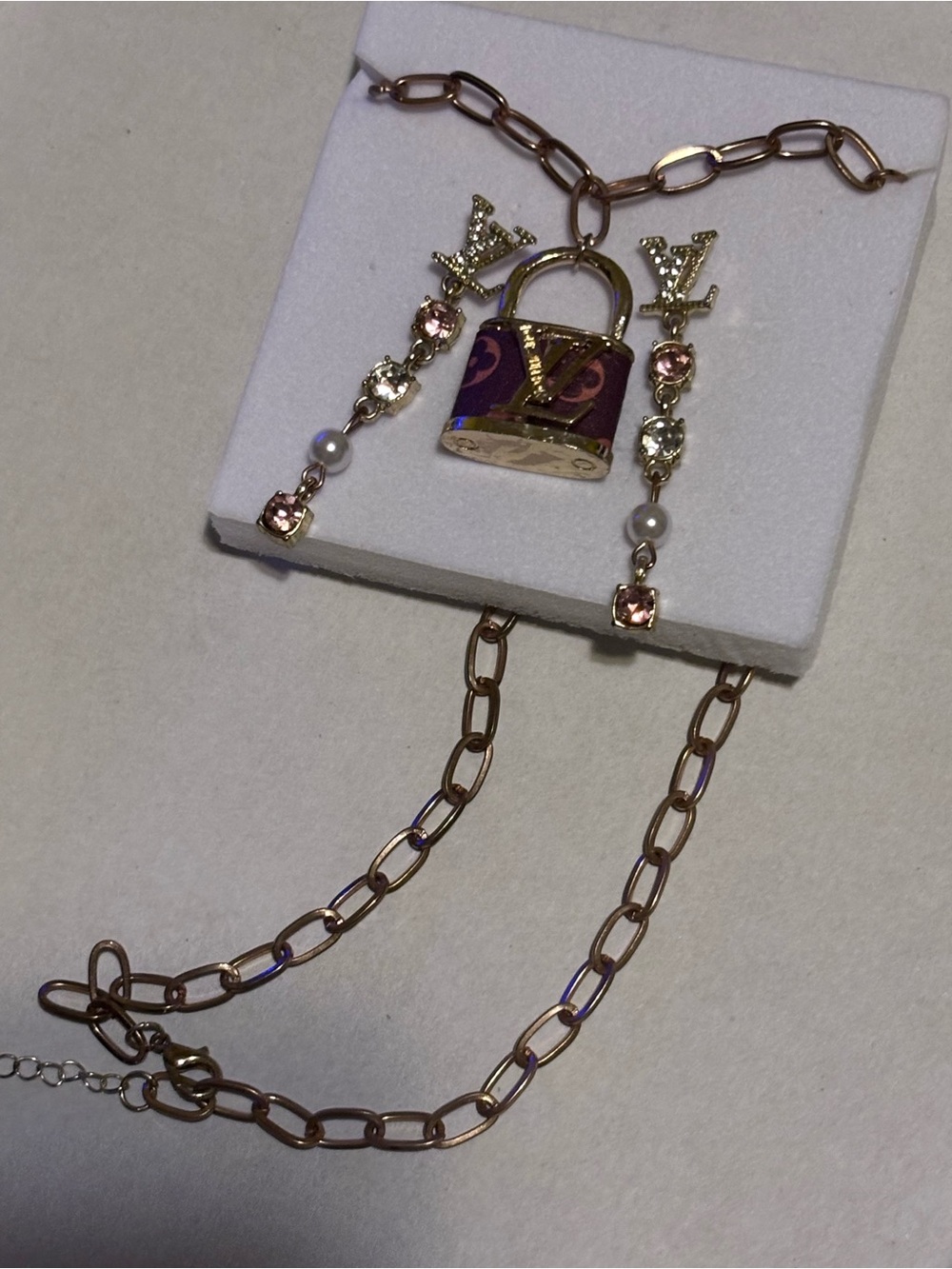 Gold-Tone Padlock Pendant Necklace with Pink Accents